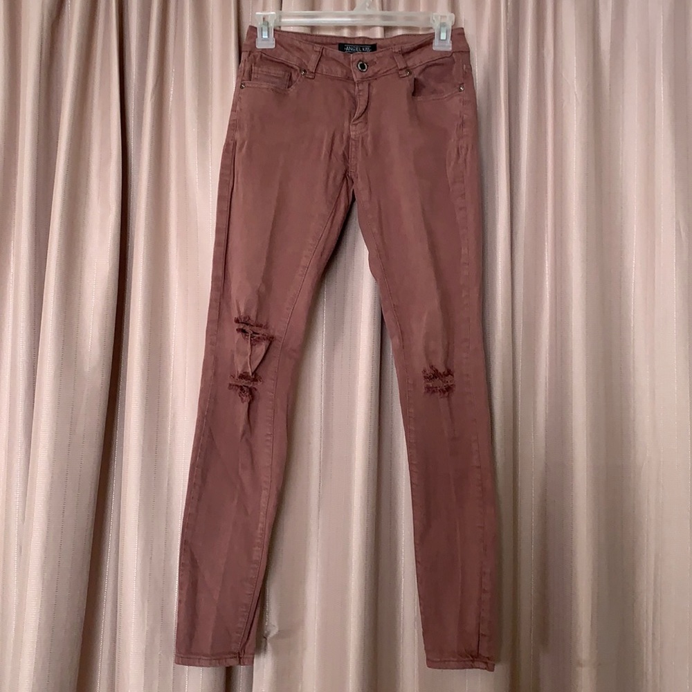 Mid-rise distressed jeans
